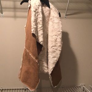 Leather like asymmetrical vest